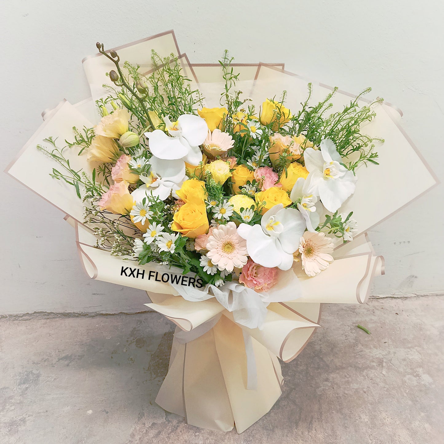 yellow and peach flower bouquet for happy events singapore florist free delivery
