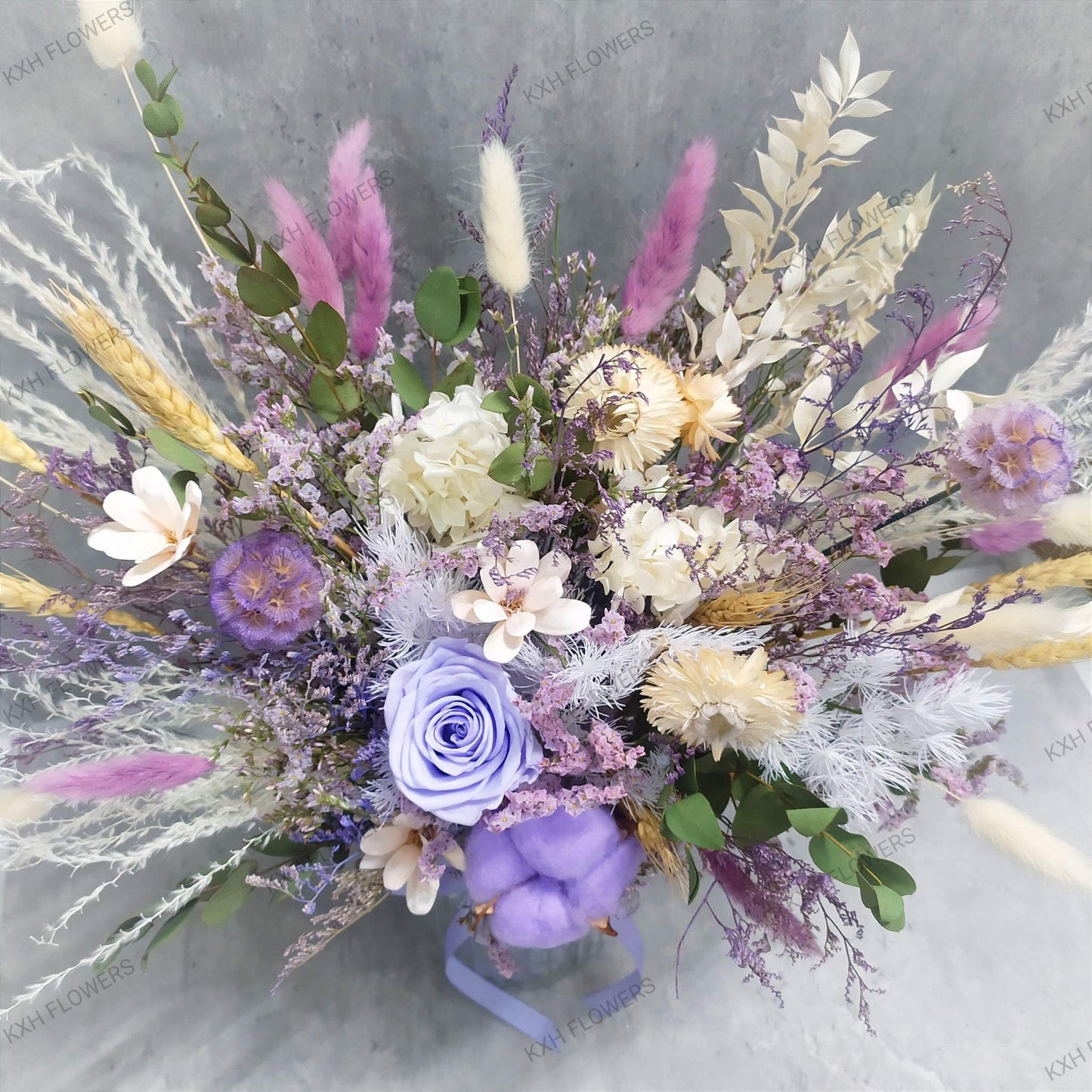 purple preserved flower arrangement in vase singapore free delivery