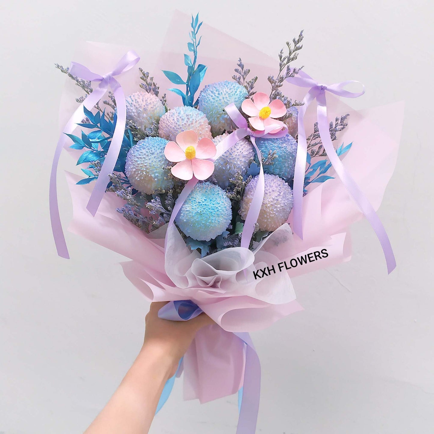 9 purple pink and blue ping pong in pink wrapping sg florist free delivery