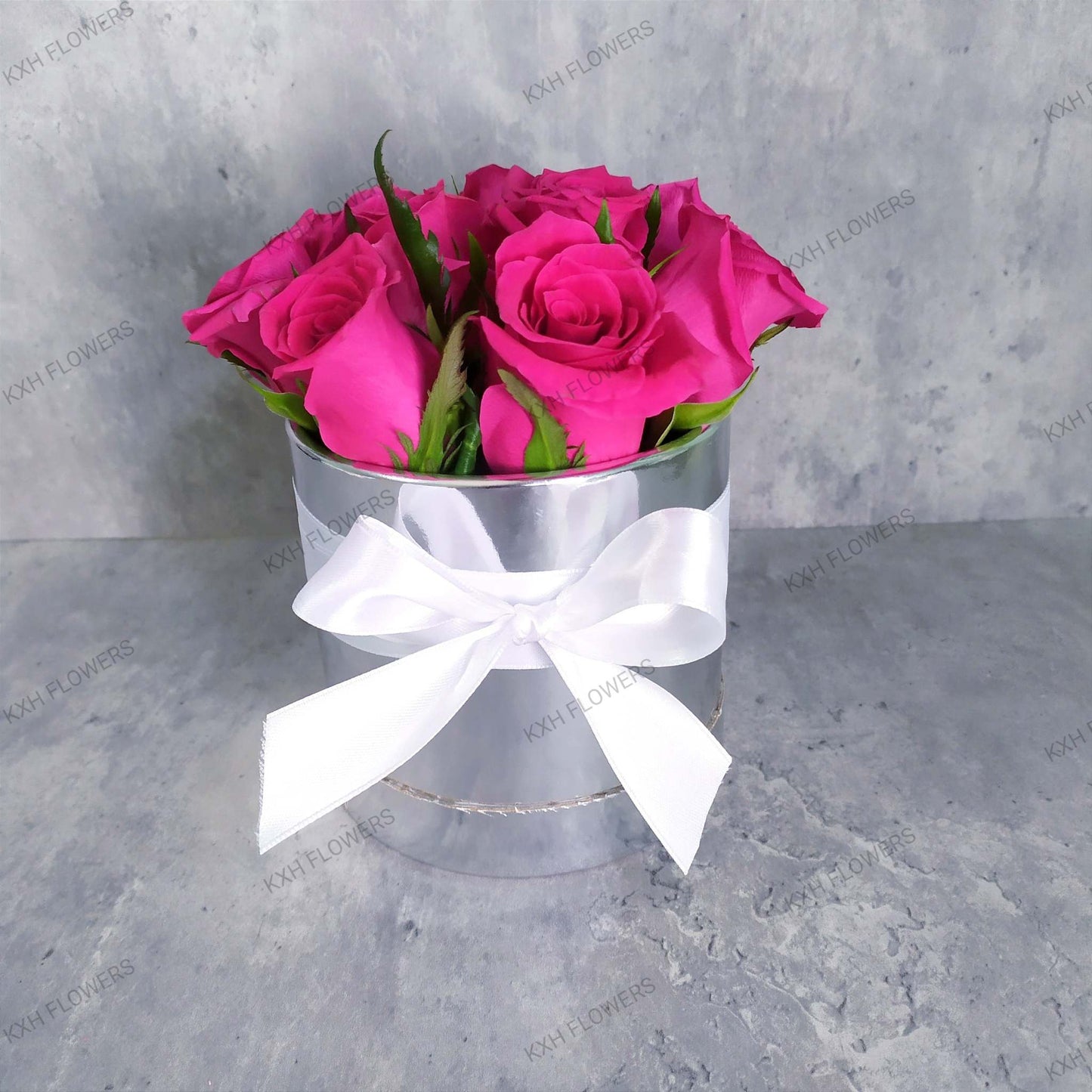 Hot Pink Roses arrangement in silver box