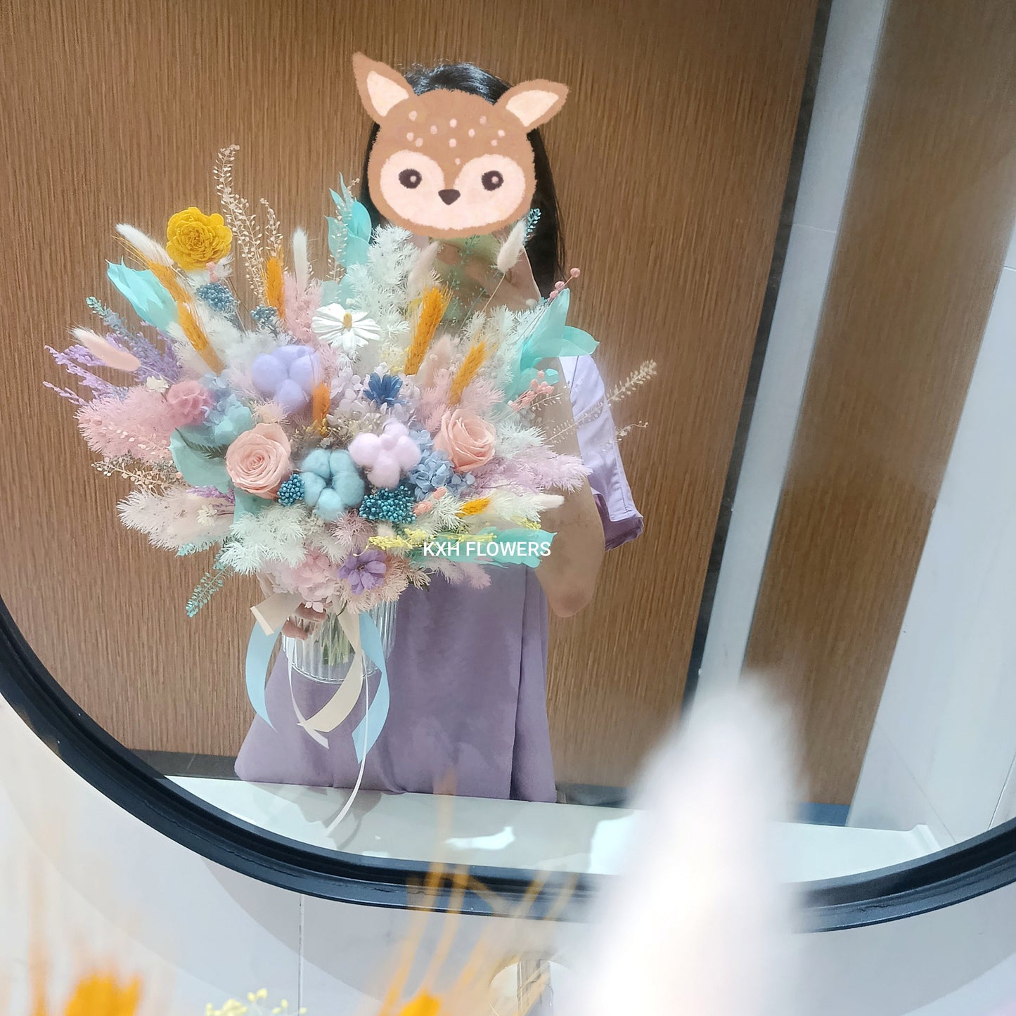 preserved roses, pastel cotton flowers, daisy, solawood flower, mint blue leaves and orange wheat in clear vase sg florist delivery