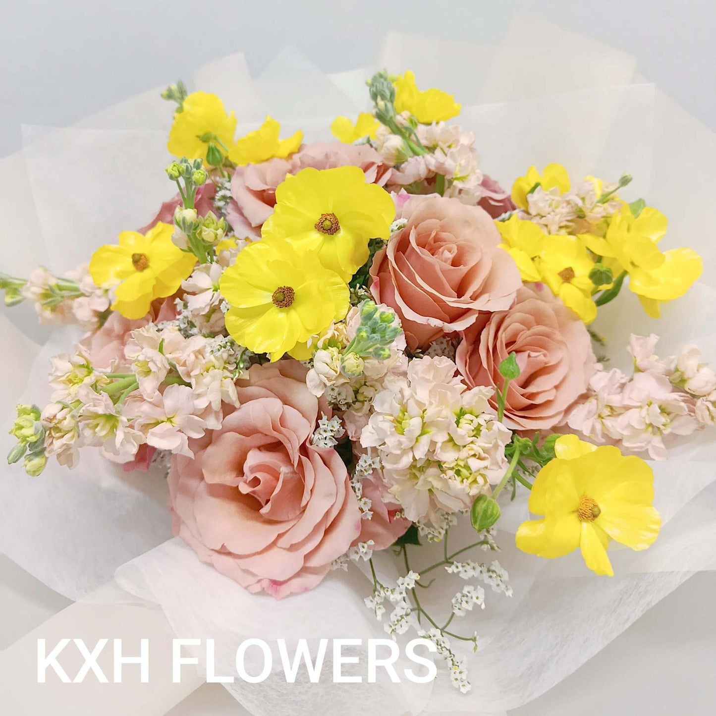 cappucino roses yellow butterfly ranunculus champagne matthiolas sg online florist delivery