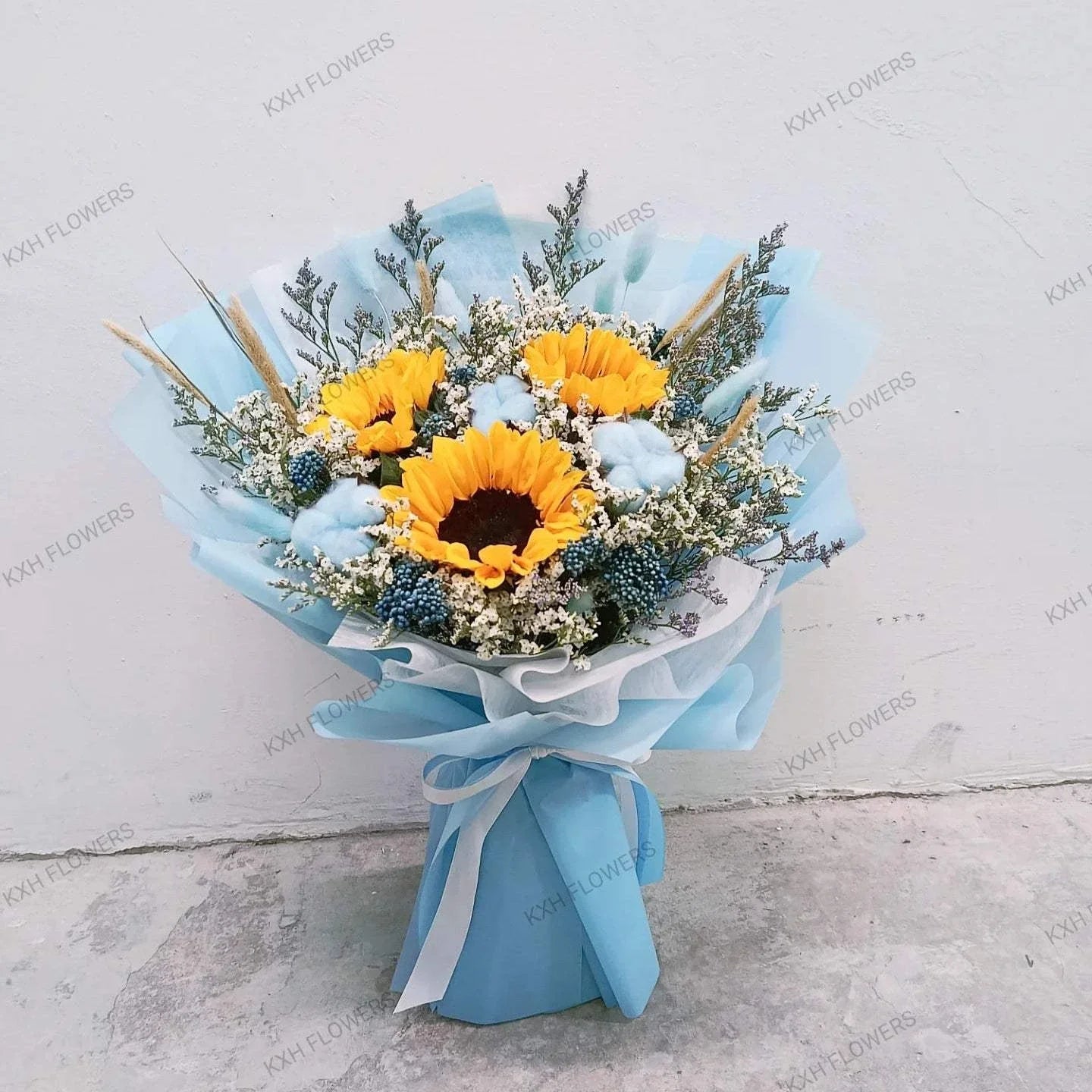 3 sunflowers blue fillers for gentleman sg florist free delivery