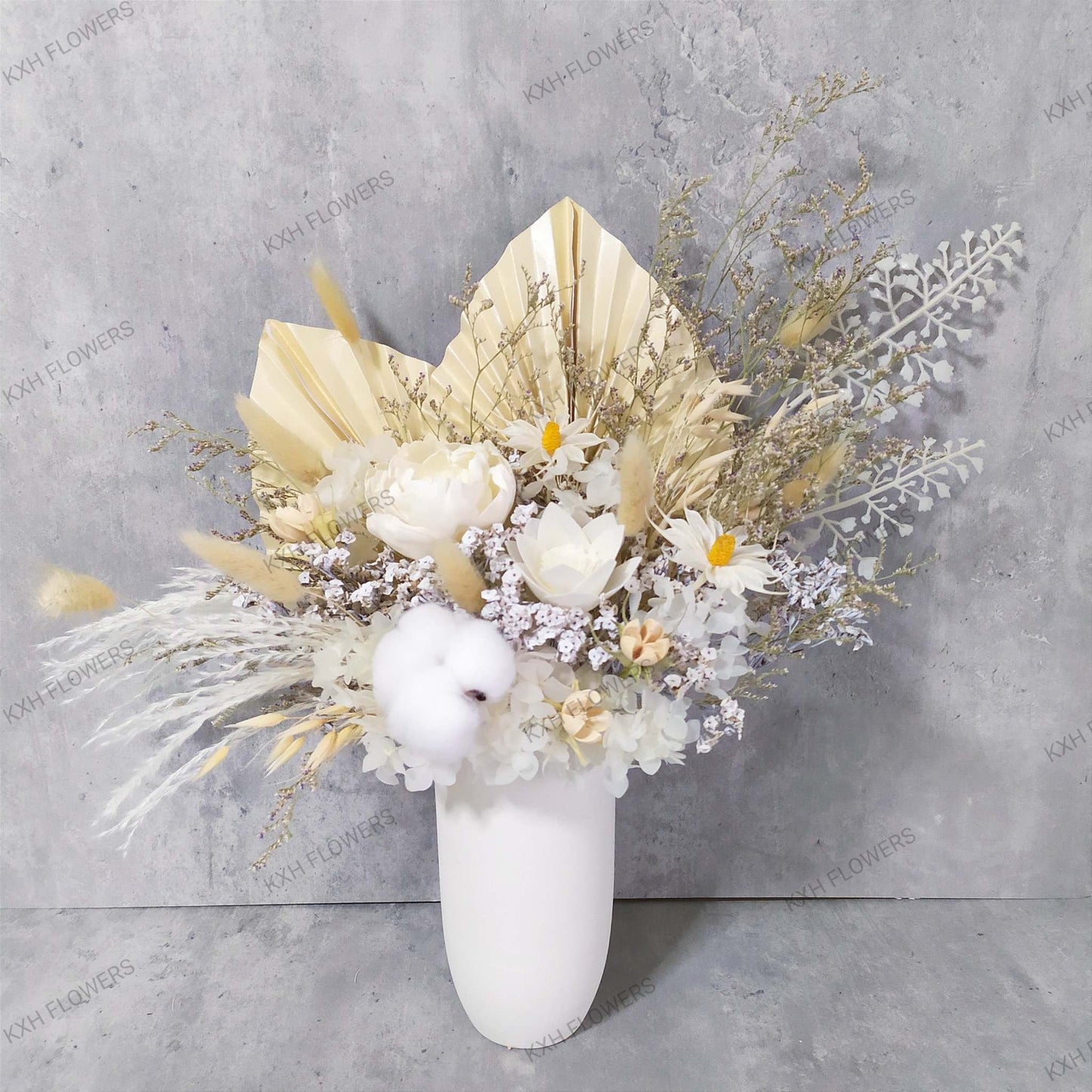 preserved white floral arrangement in ceramic vase singapore florist