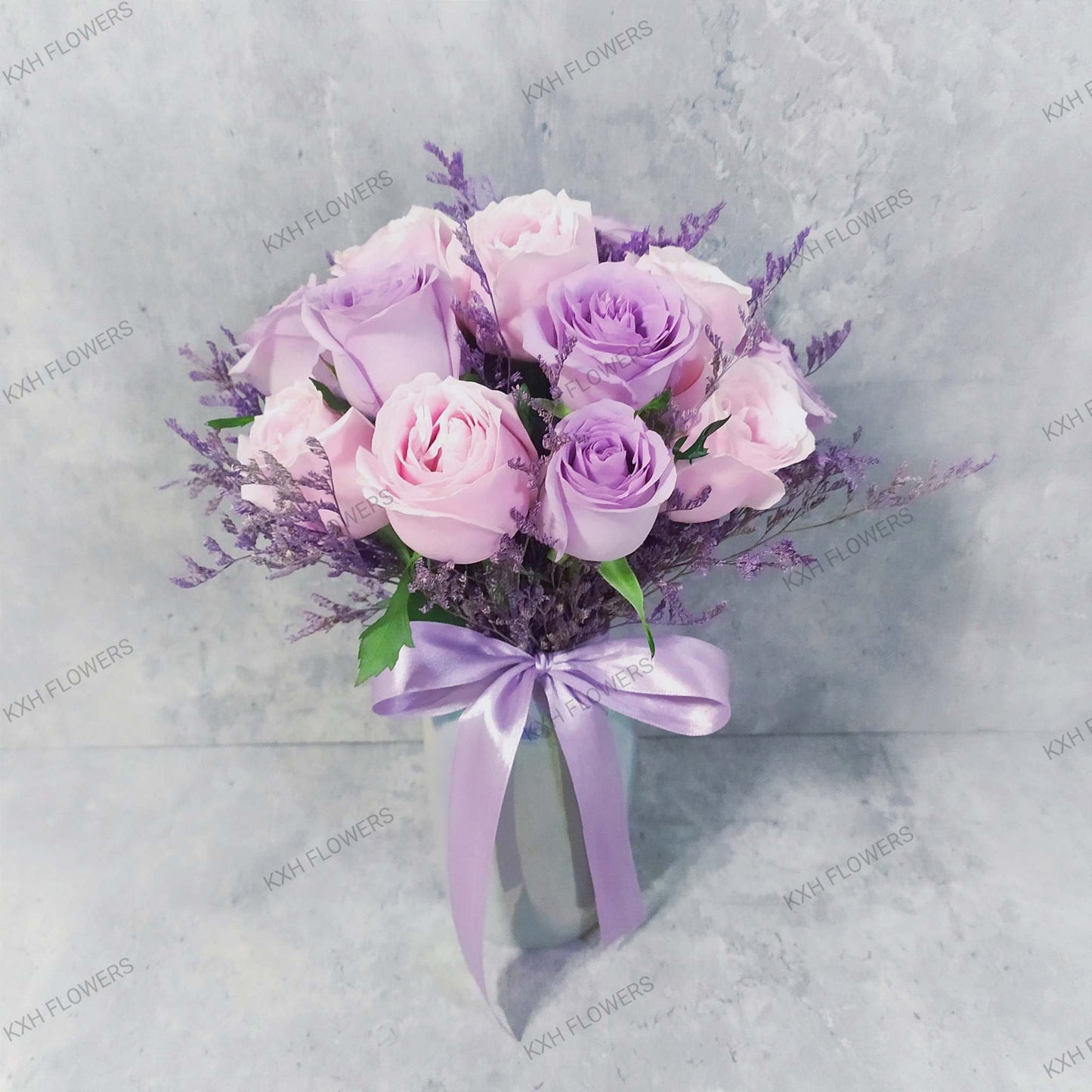 Pink and purple roses in vase singapore florist with free delivery