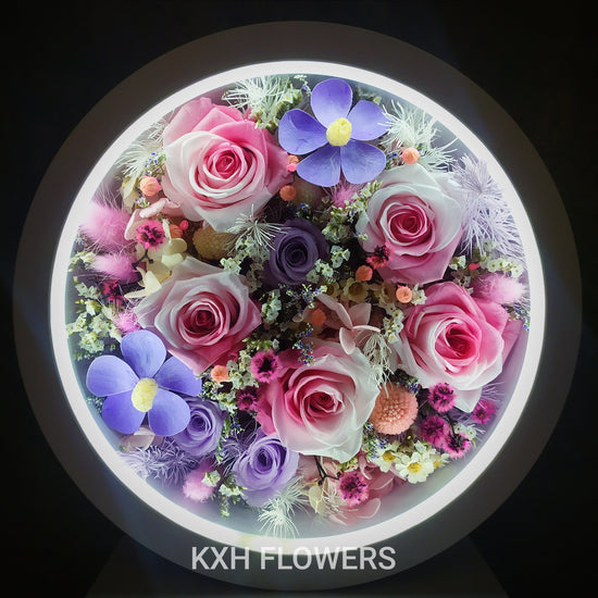 LED night light box with pink and purple preserved flowers