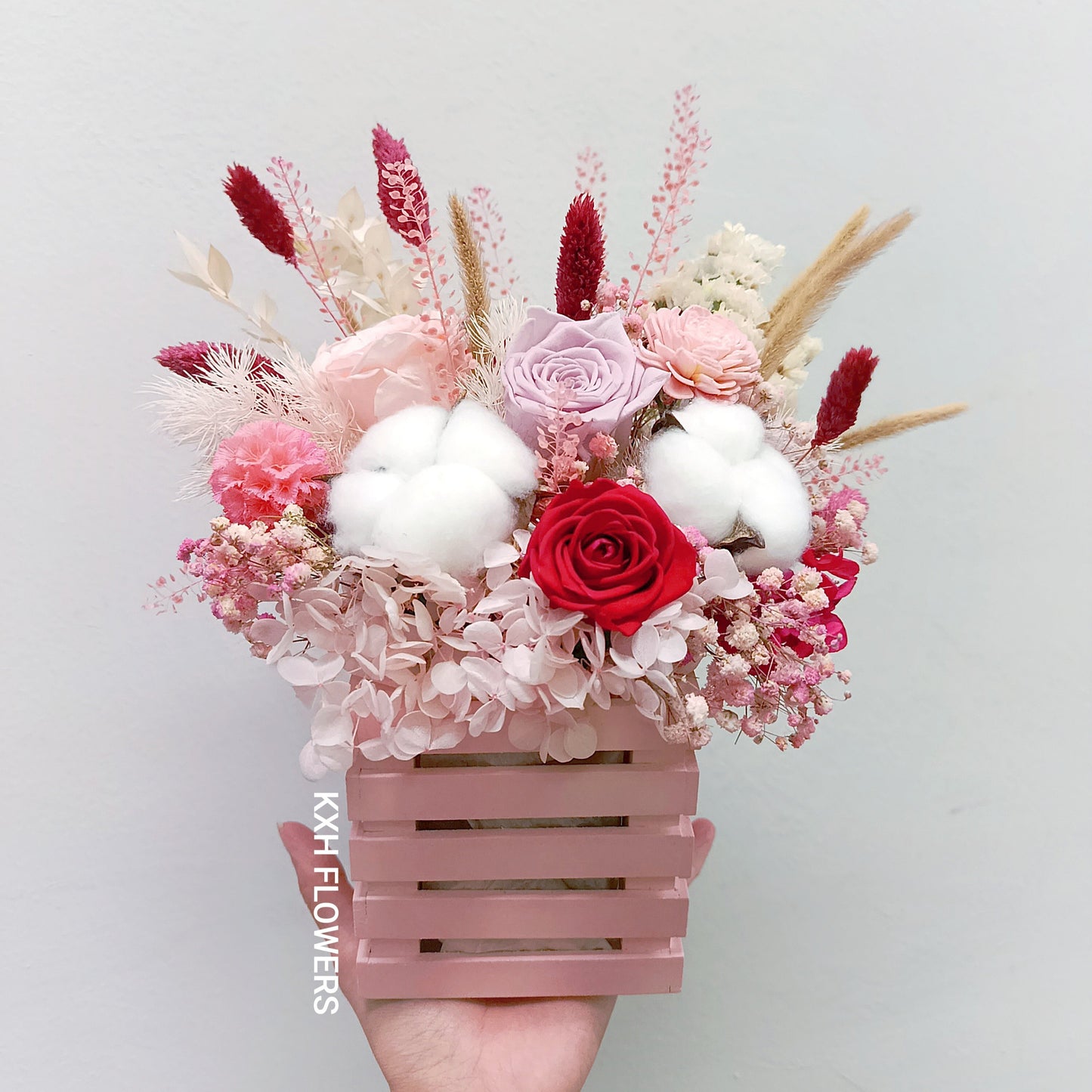 preserved roses in pink wooden crate arrangement sg online florist free singapore delivery kallang