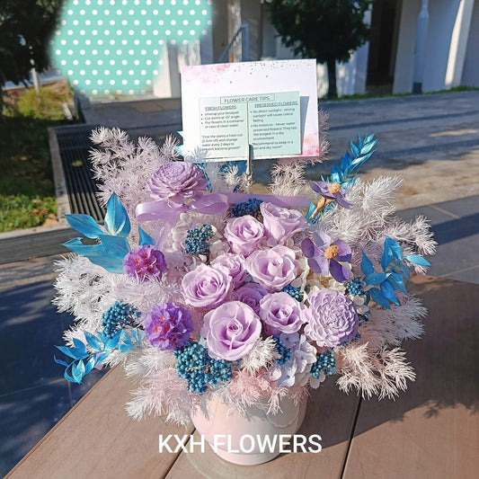 Preserved purple roses with blue leaves with message card sg florist
