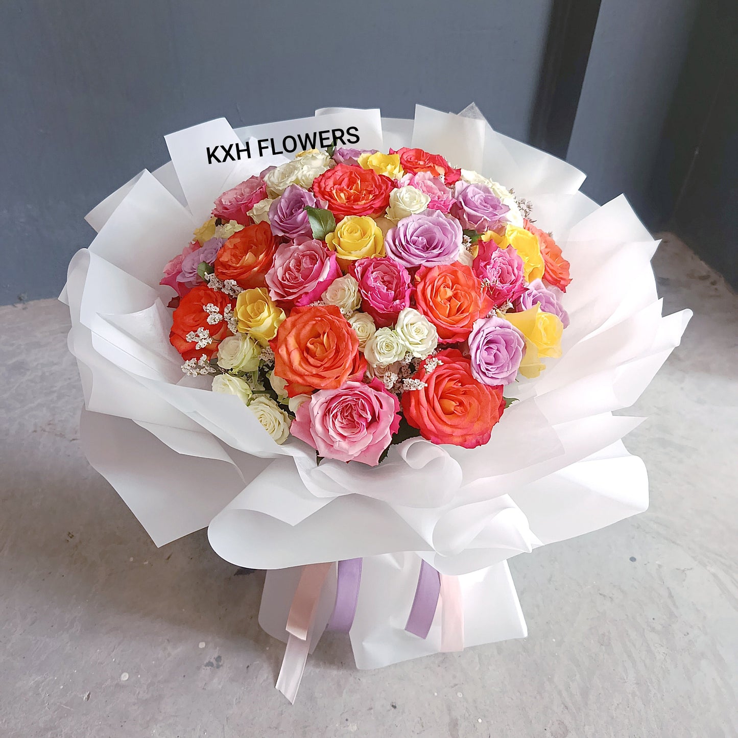 35 stalks all roses bouquet. Purple roses, yellow roses, pink roses, orange roses and white spray roses singapore florist sg flower delivery