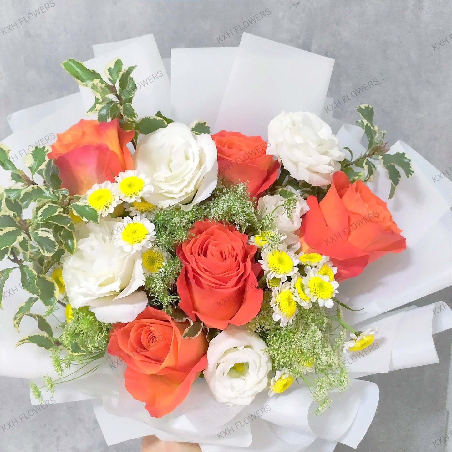 orange roses and white flower singapore florist delivery