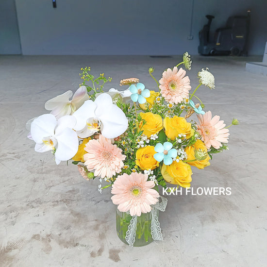 bright colour but still classy vase arrangement for birthdays congratulations and celebration singapore
