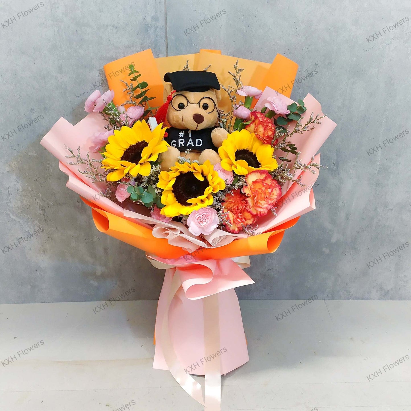 3 sunflowers graduation bear orange and pink bouquet