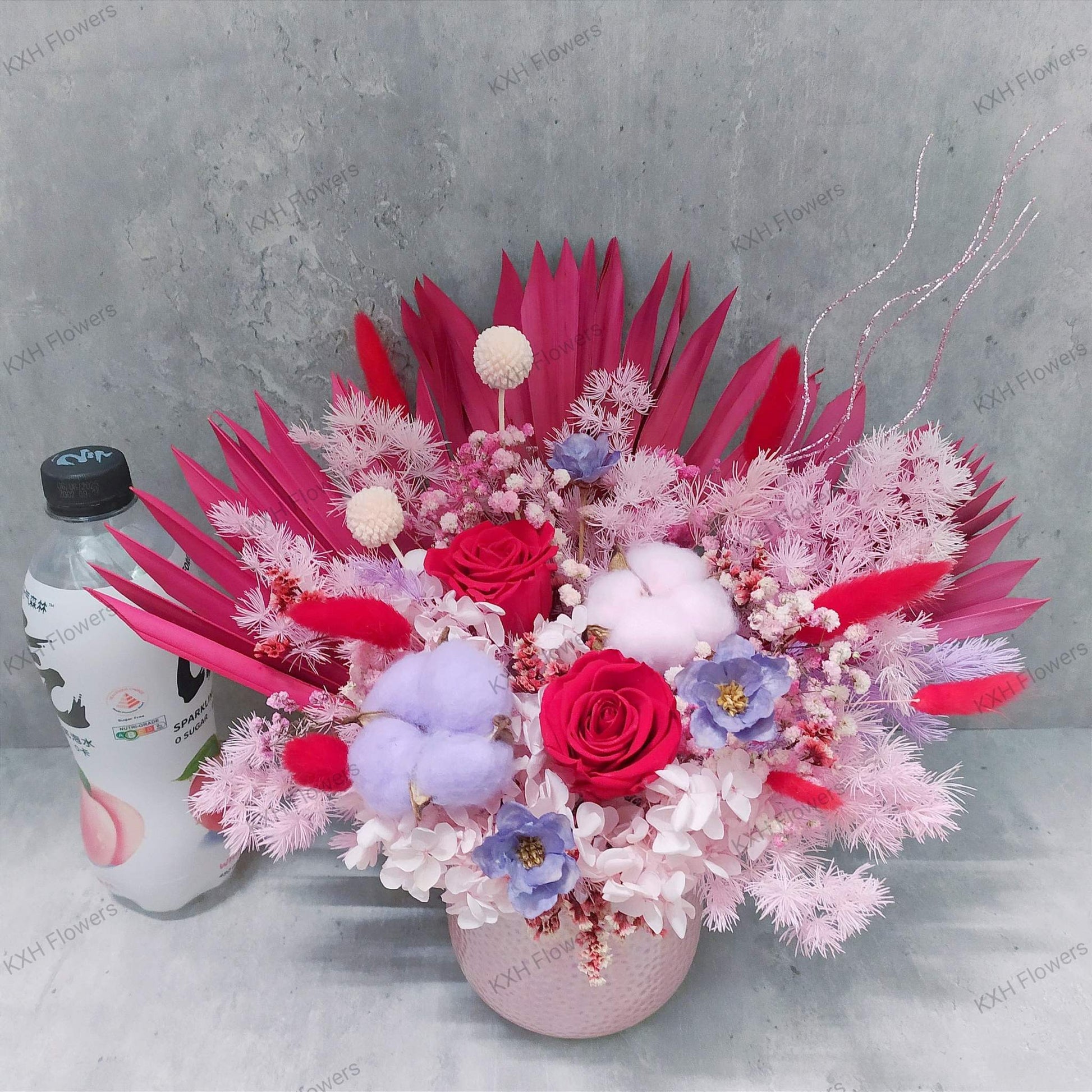 red and pink preserved floral arrangement singapore florist with free delivery service