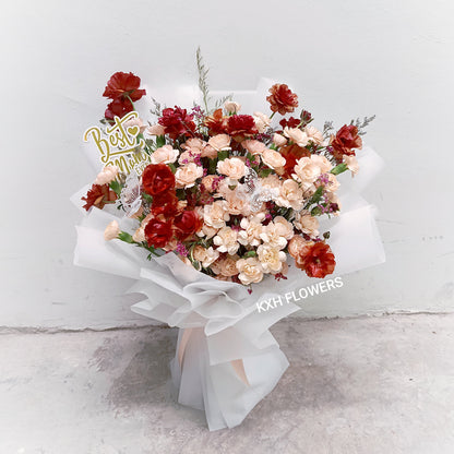 peach carnations and maroon butterfly ranunculus free SG delivery singapore florist