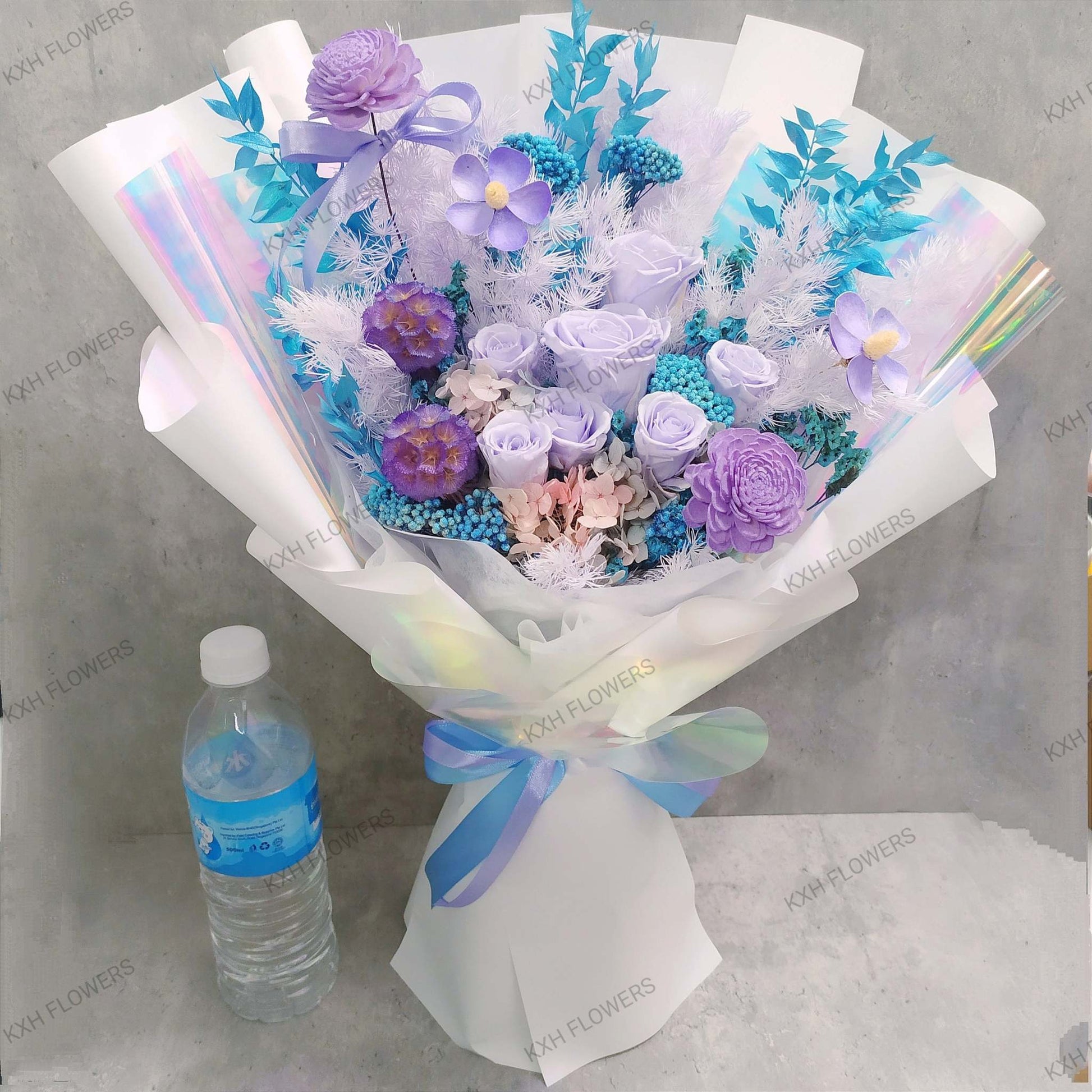 fancy preserved roses bouquet in blue and purple 