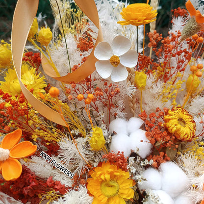 Decorative preserved floral arrangement with orange, yellow, and white flowers singapore flower delivery