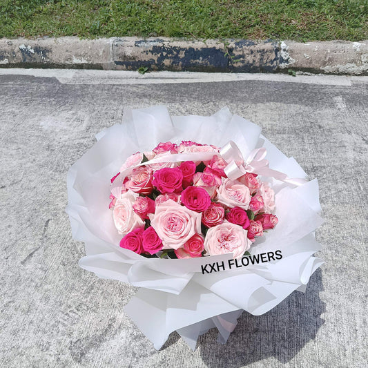 35 mixed light pink, hot pink and medium pink roses