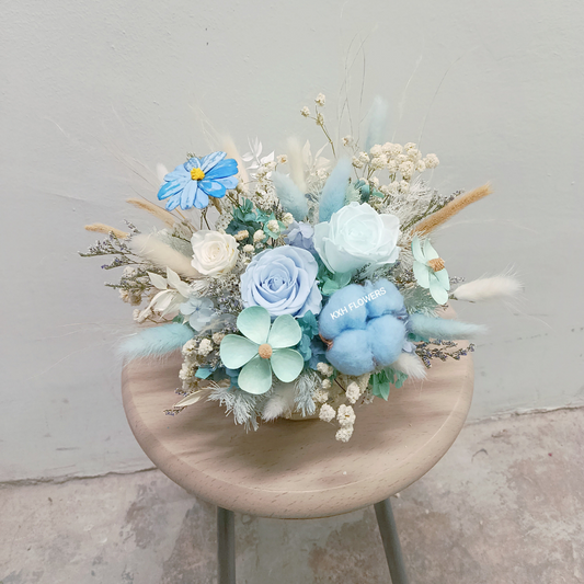 monday blues 2 preserved blue roses  blue cotton flower 3 daisy 1 mini rose baby breath assorted fillers
