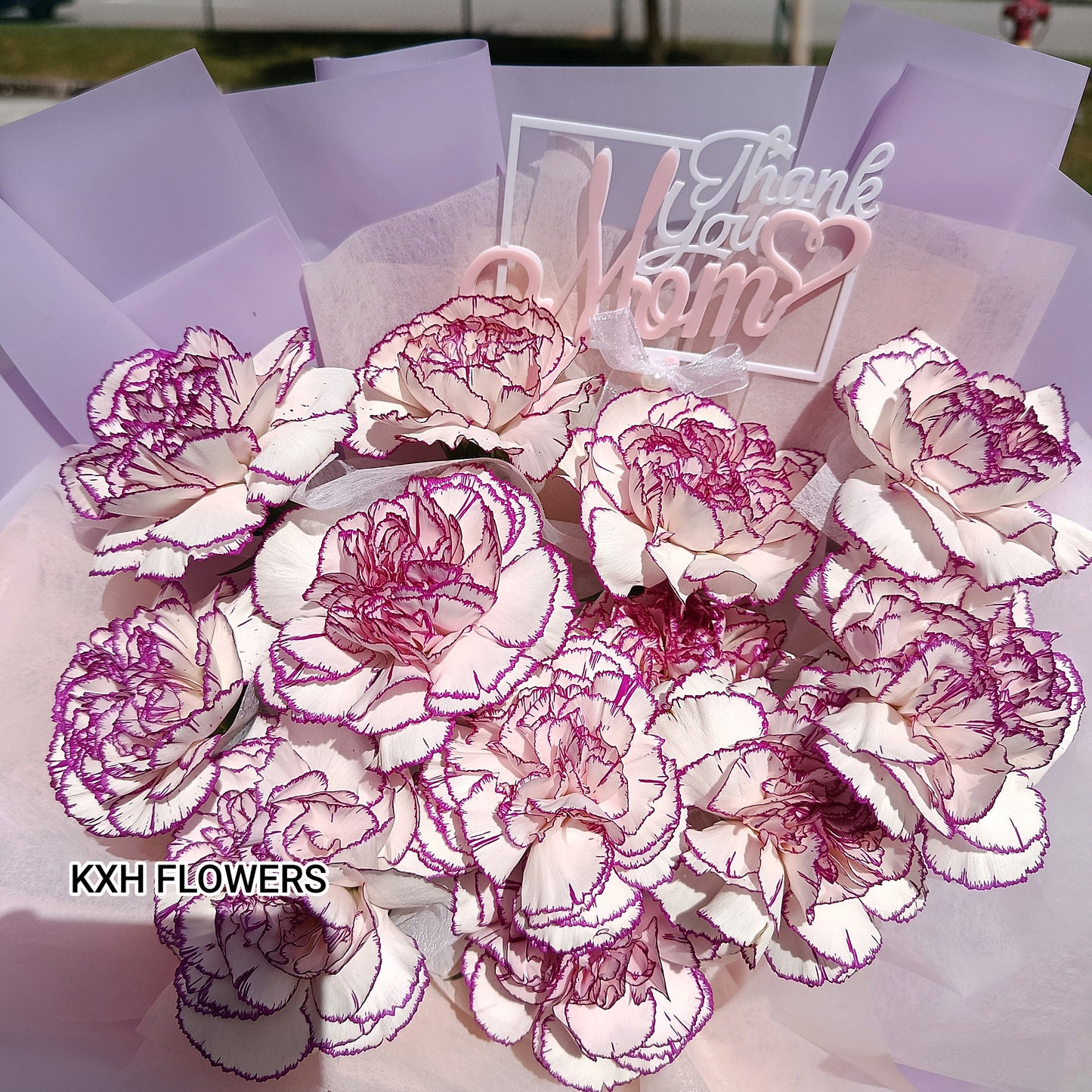 2 tone purple carnations bouquet with thank you mom tag