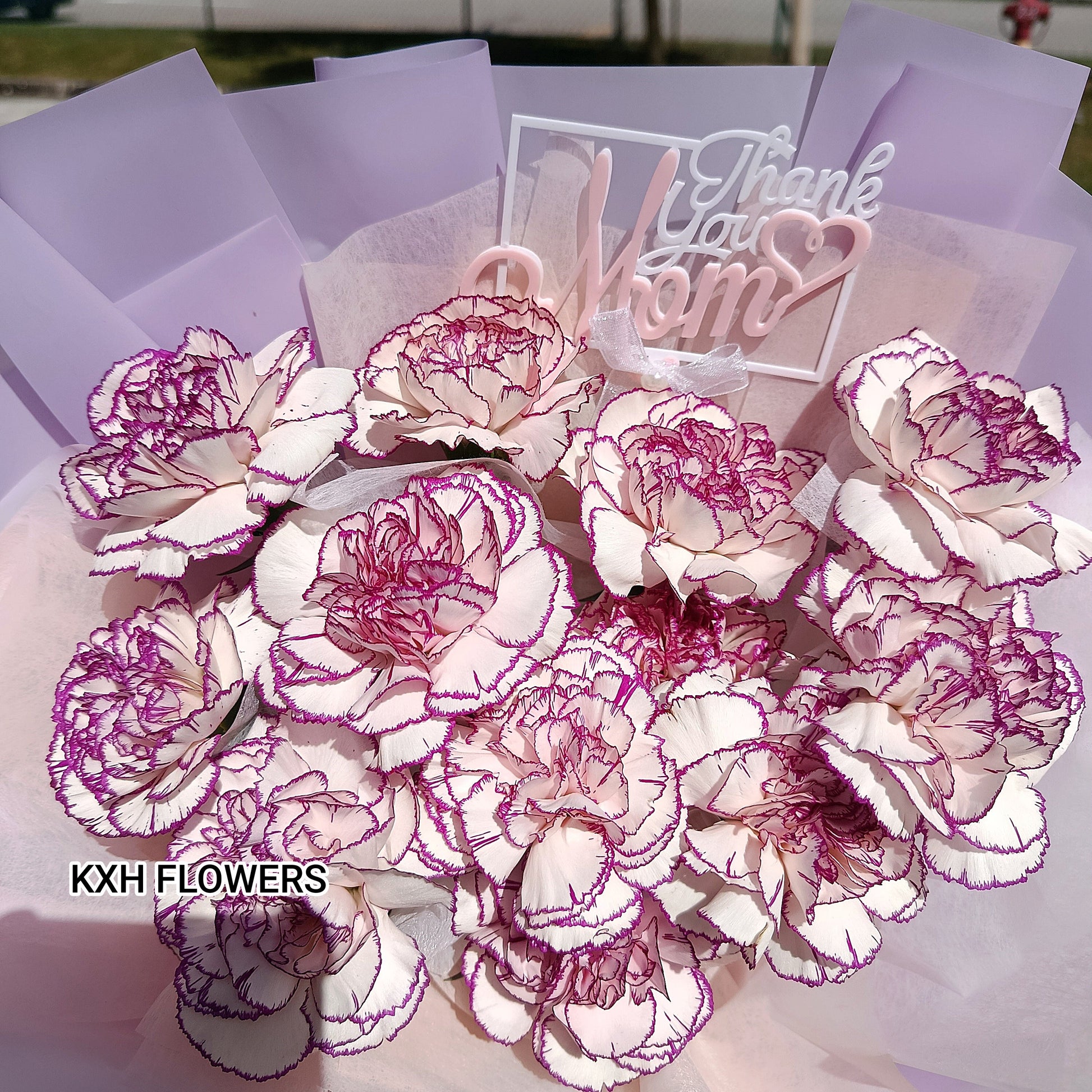 2 tone purple carnations bouquet with thank you mom tag
