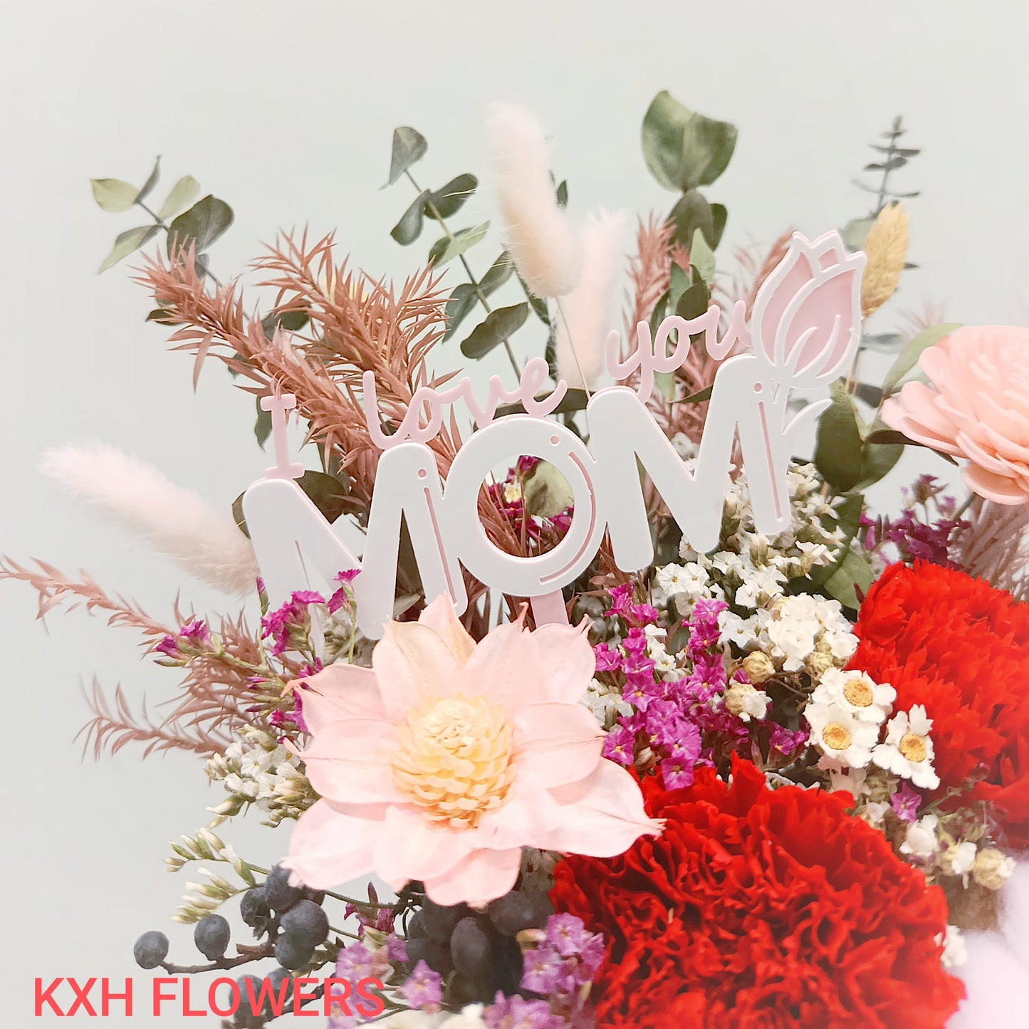 preserved red carnations floral arrangement with i love you mom tag sg online florist free delivery