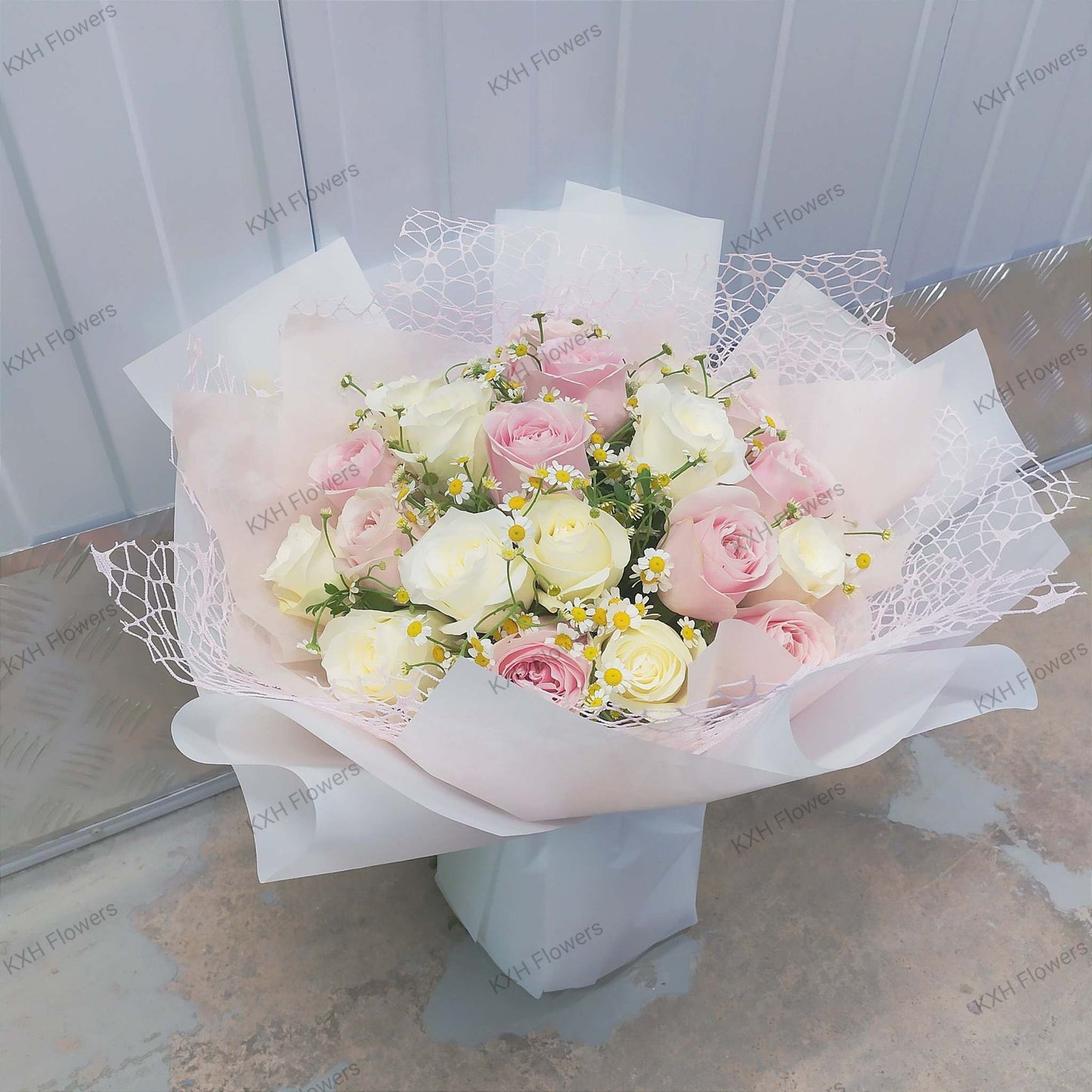 pink and white roses with chamomile daisies singapore florist free delivery