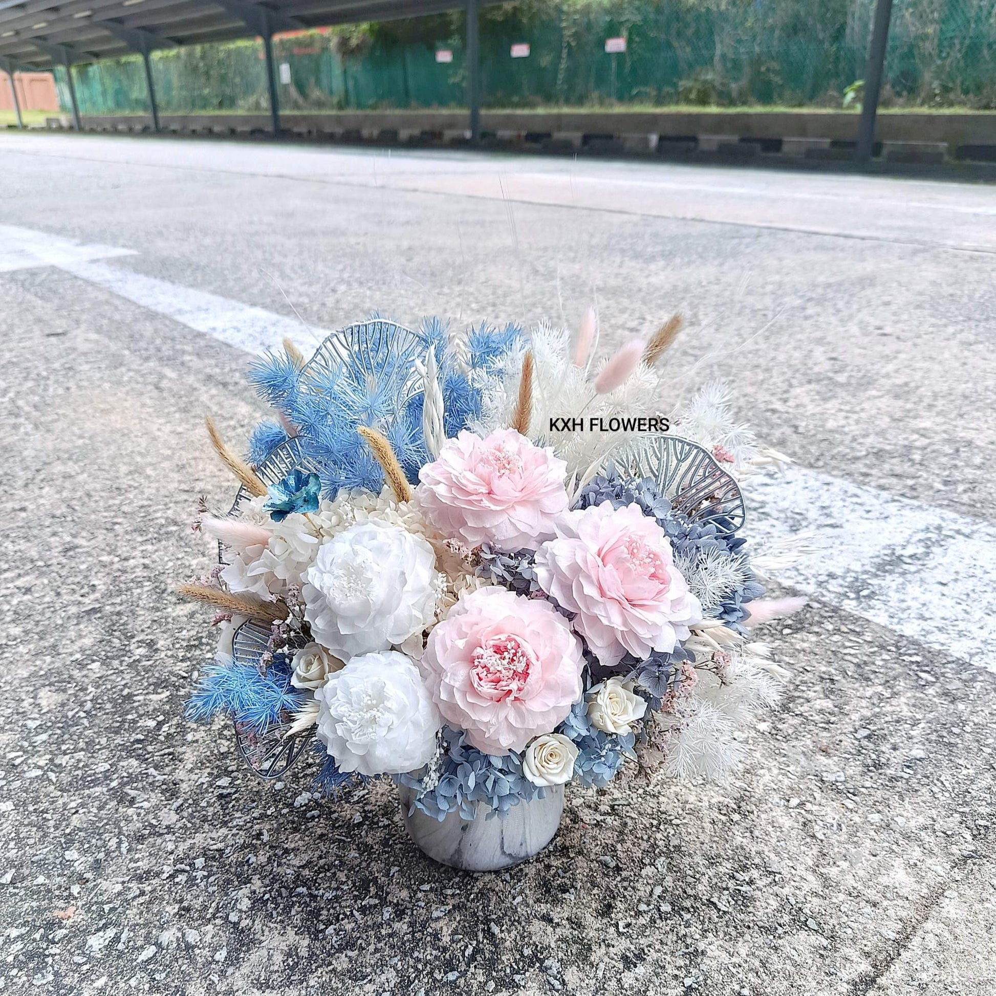 Modern luxury flower arrangement using preserved peonies bespoke custom flowers singapore florist delivery