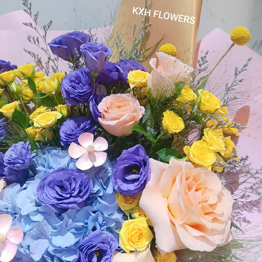 unique colours premium flower bouquet purple eustomas blue hydragea yellow spray roses peach roses and assorted fillers