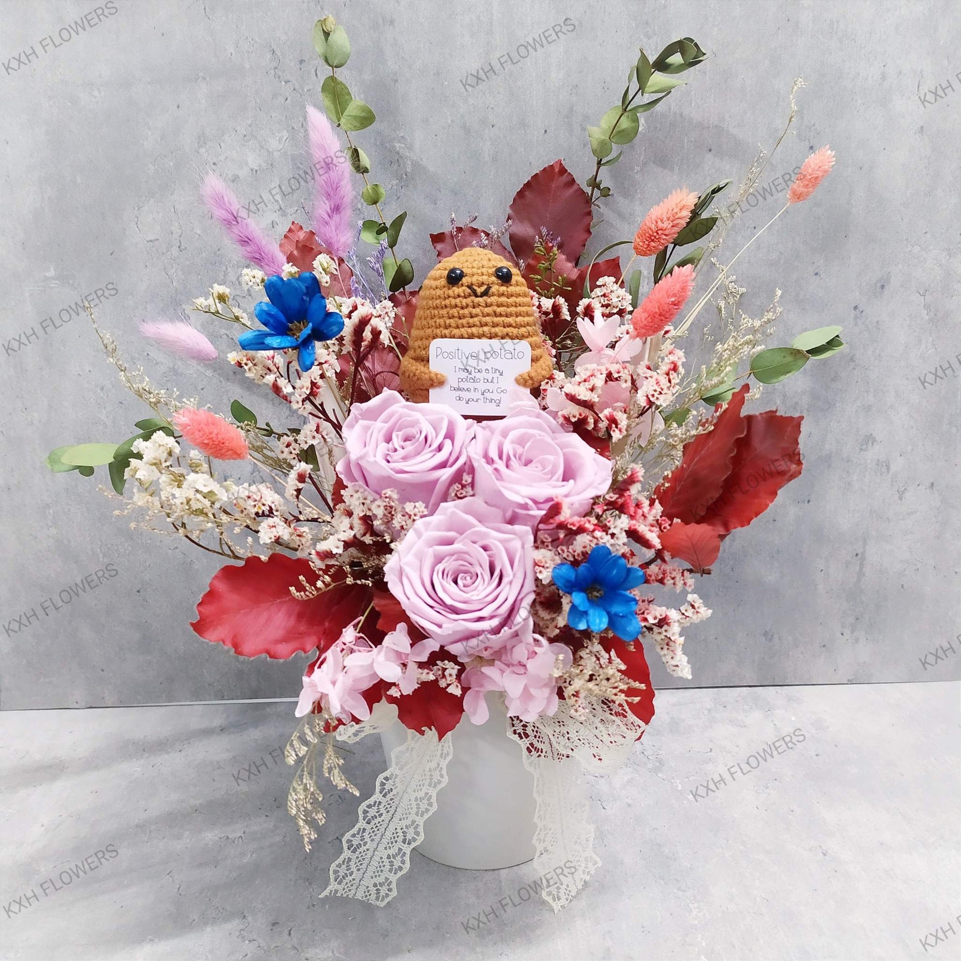 Crochet figure and preserved flowers - KXH Flowers