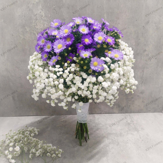 purple daisies and white baby's breath bridal bouquet