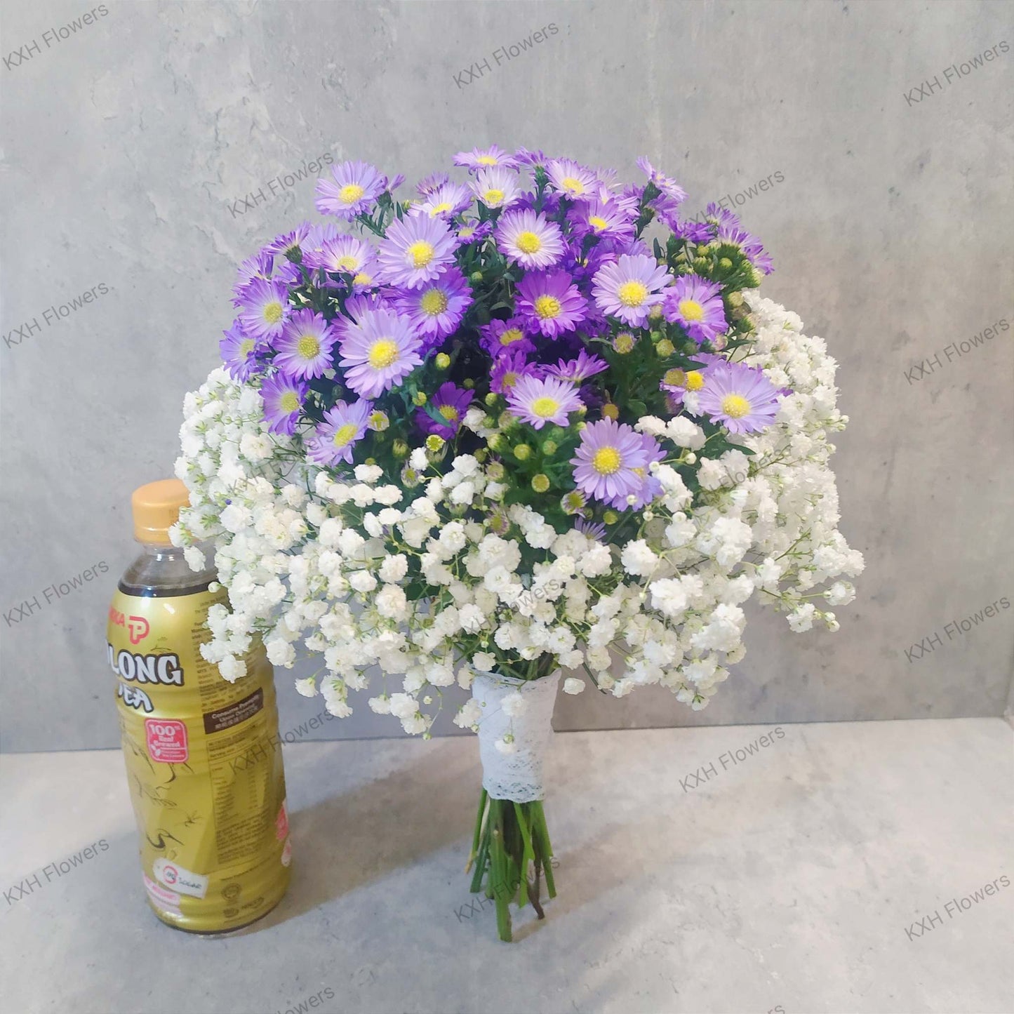 baby's breath and purple daisies bouquet