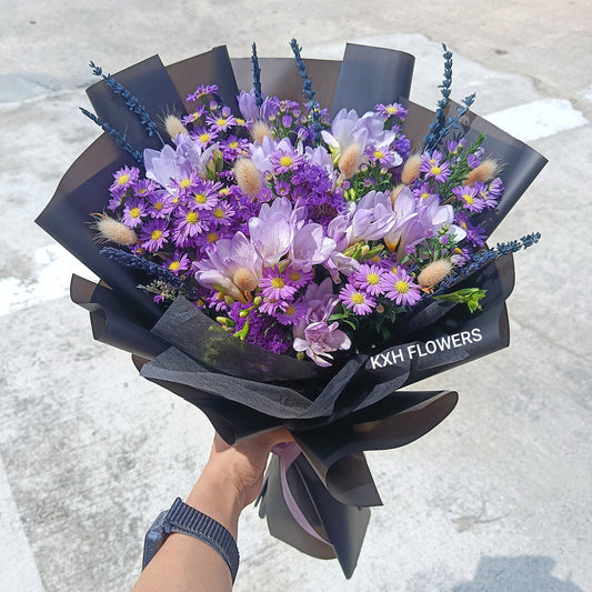 purple freesias bouquet with purple mini daisies and preserved lavender singapore