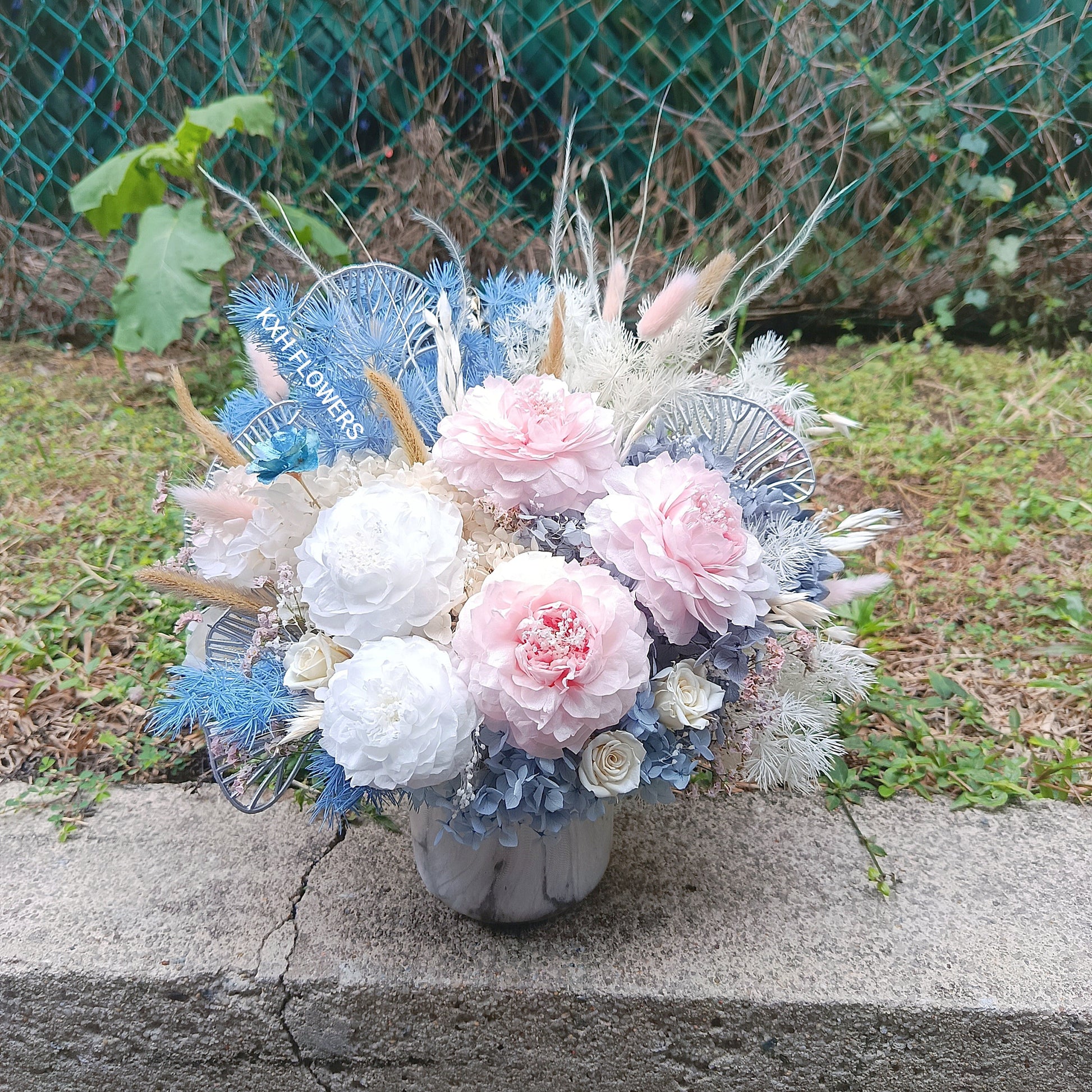 dusty blue light pink and white preserved flower arrangement singapore online florist with free delivery