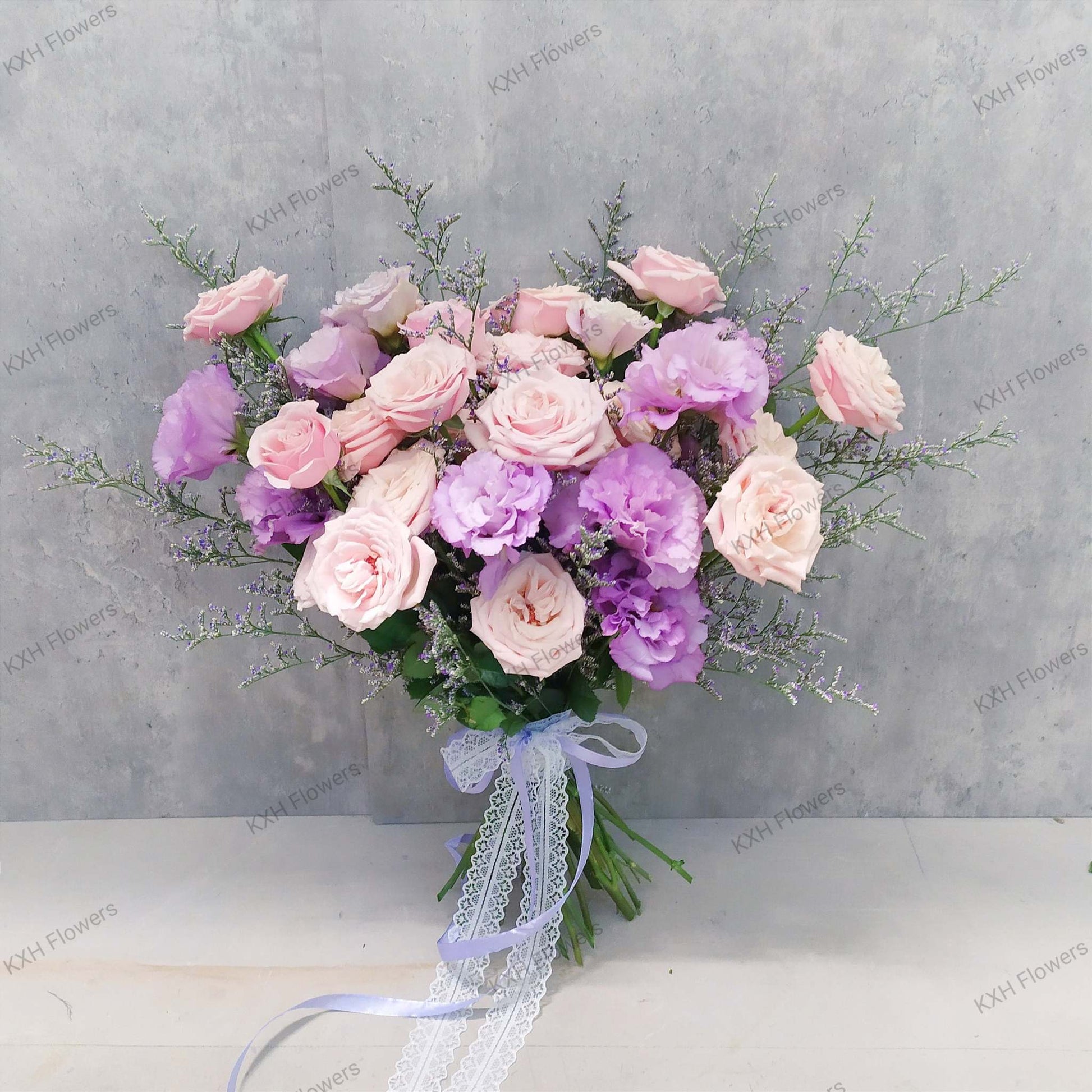 singapore bridal bouquet spray roses and lilac eustomas