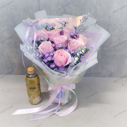 8 light pink roses and purple daisies bouquet