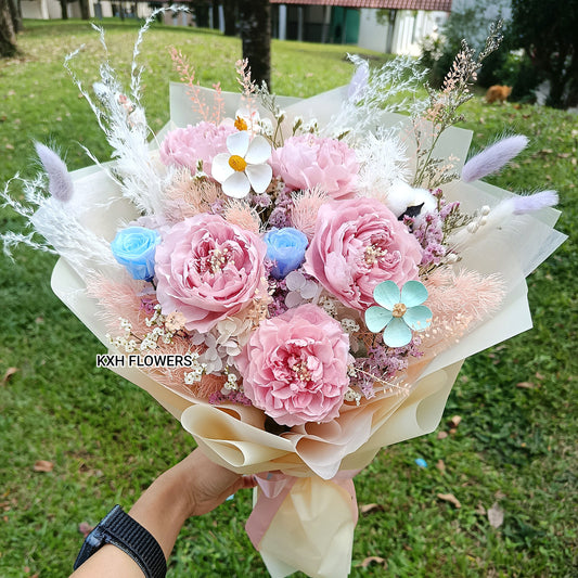 dusty pink preserved peonies and mini blue roses singapore florist delivery