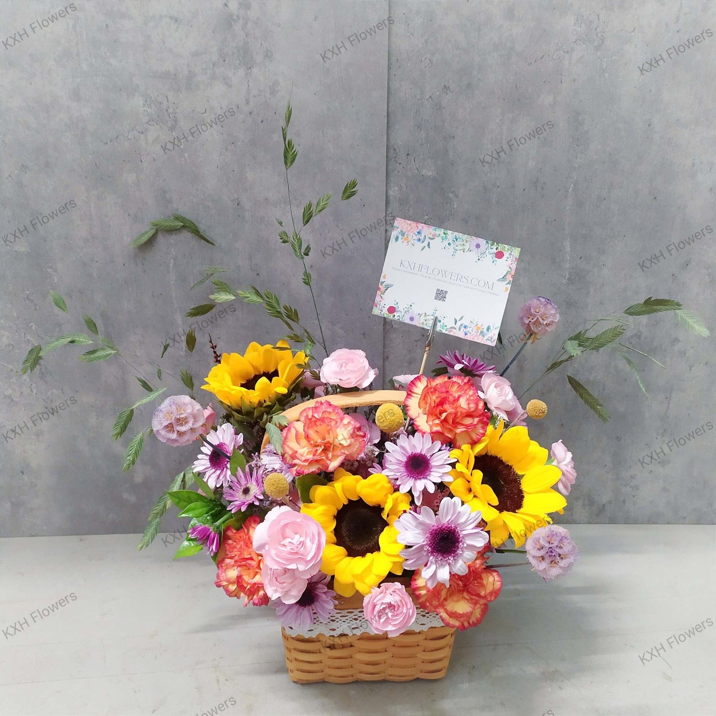 sunflower floral basket with orange carnations purple chrysanthemum daisies sea oats and free message card