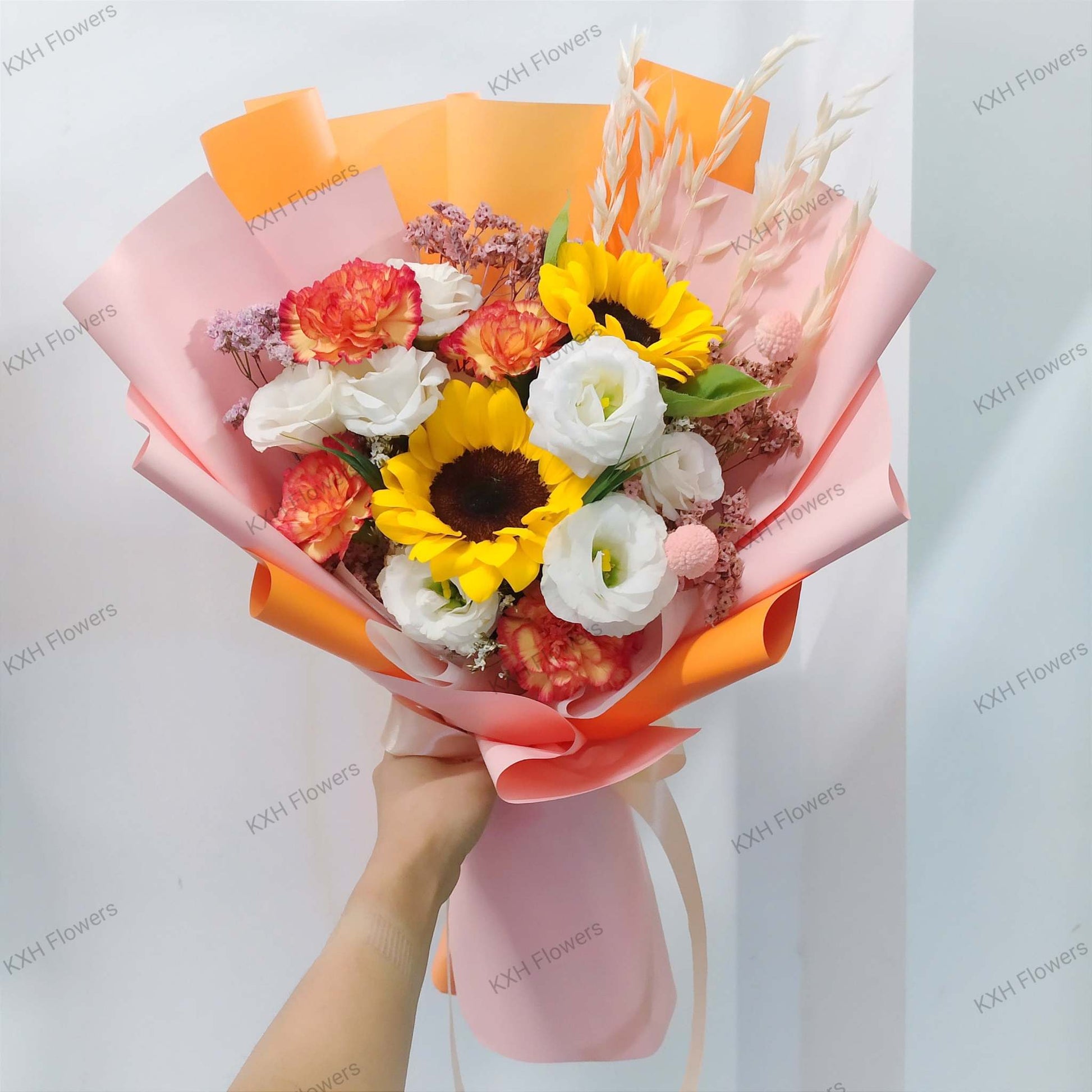 sunflower bouquet singapore delivery graduation bouquet orange carnations white eustomas