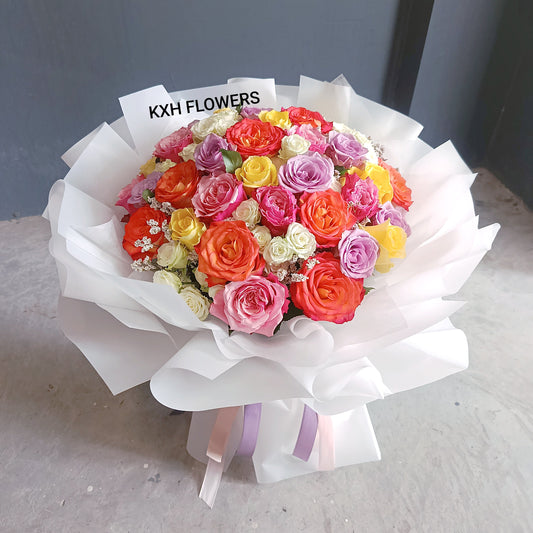 35 stalks all roses bouquet. Purple roses, yellow roses, pink roses, orange roses and white spray roses singapore florist sg flower delivery